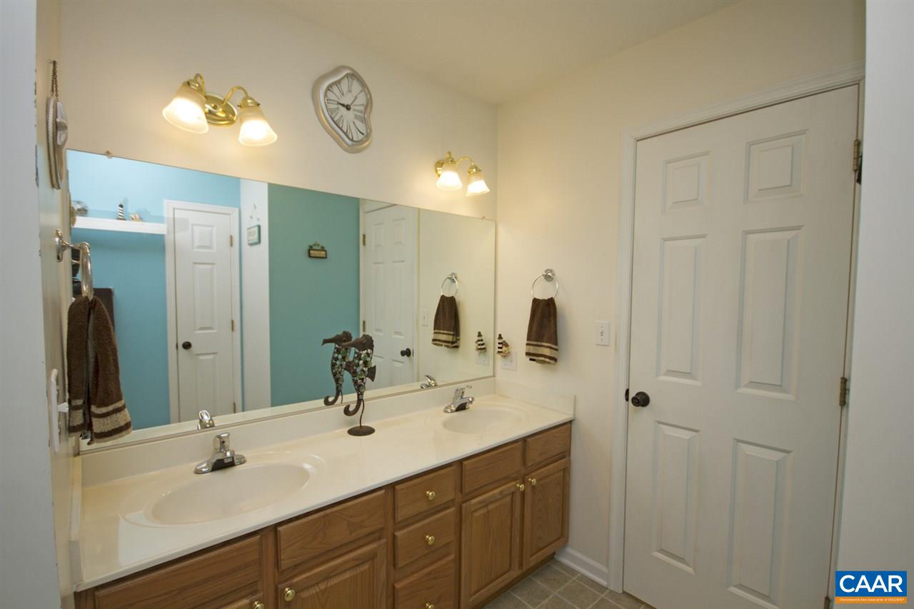 216 Inglecress Road Waynesboro, VA 22980 - Photo 20 of 28 a bathroom with double vanity sinks and a mirror