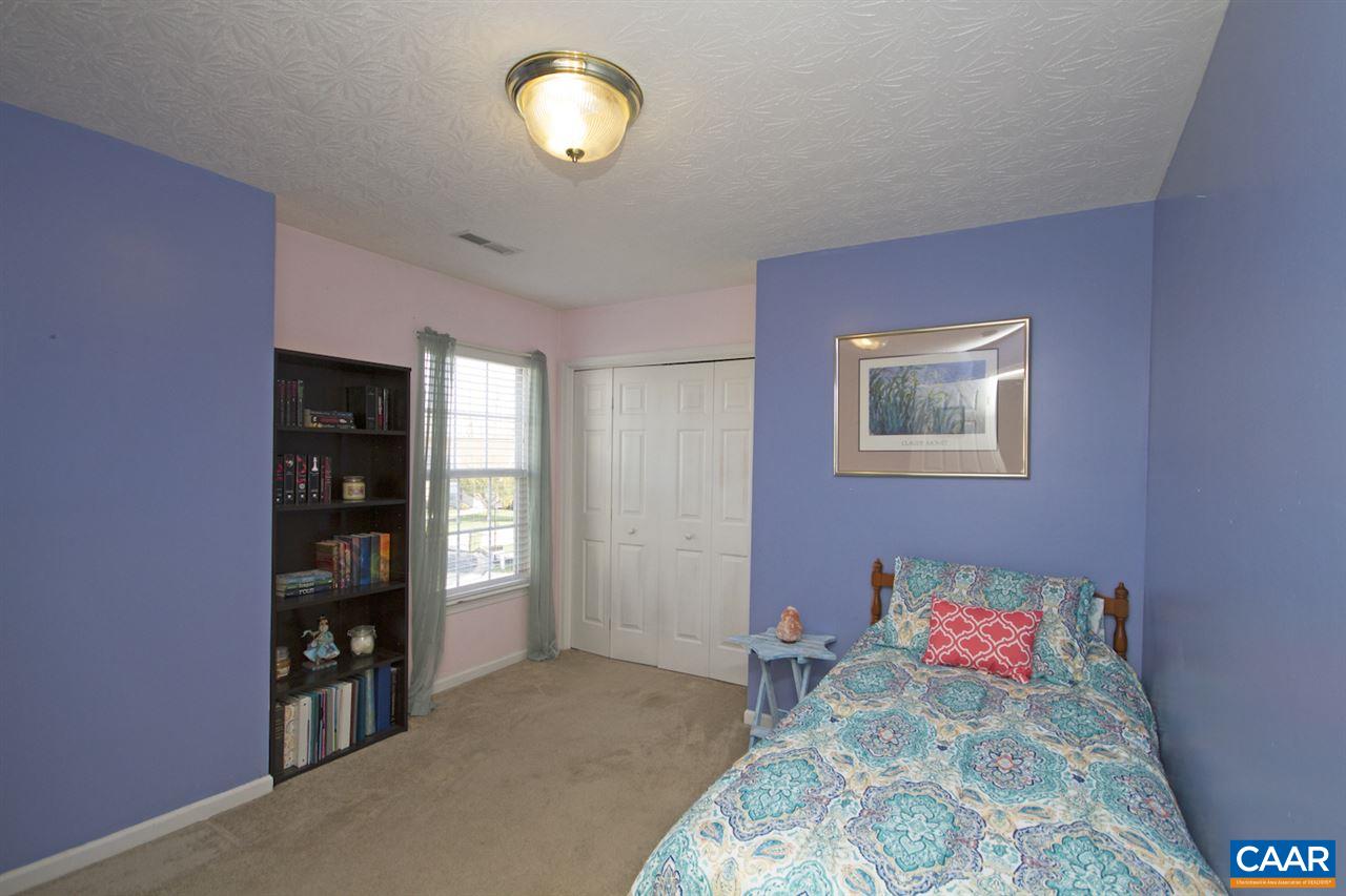 216 Inglecress Road Waynesboro, VA 22980 - Photo 23 of 28 a bedroom with a bed and a book shelf