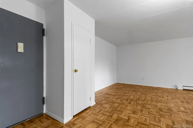 a kitchen with a stove and a refrigerator