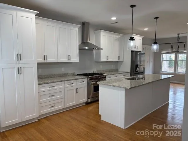 a bathroom with a sink toilet and mirror
