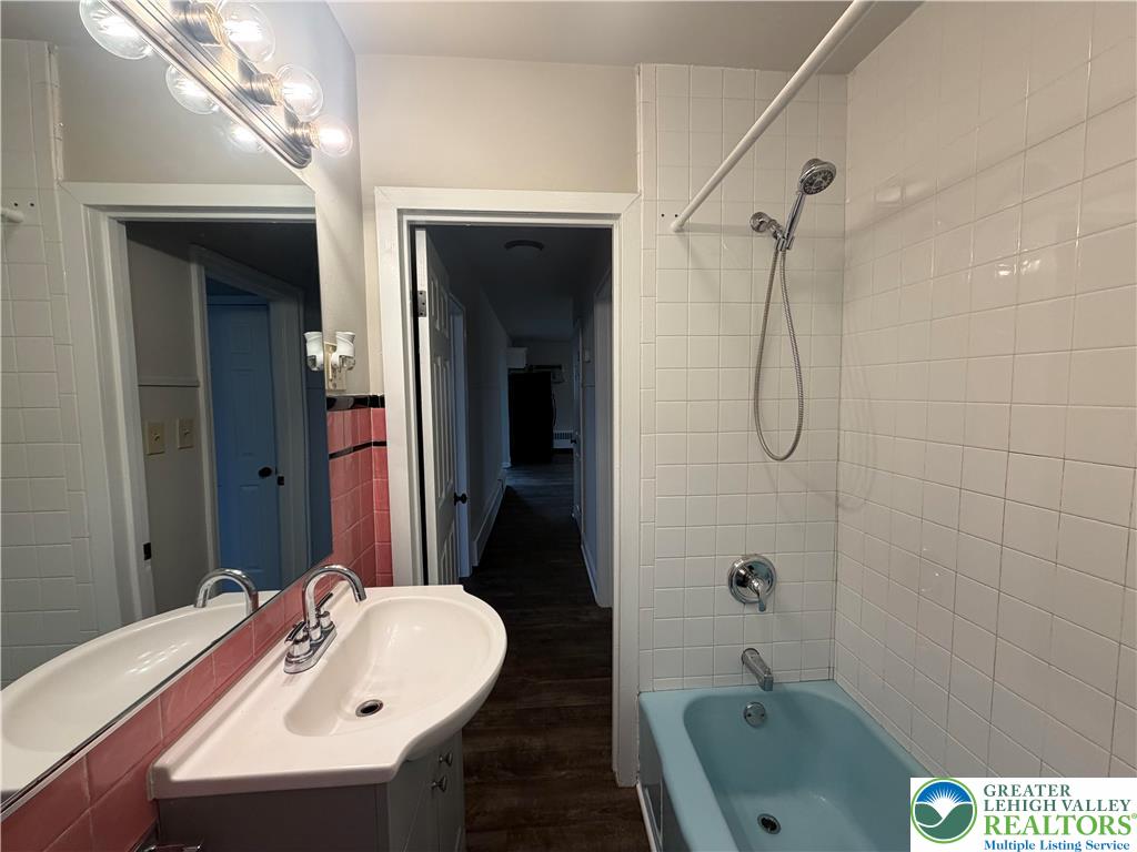 32 North Front Street Coplay, PA 18037 - Photo 13 of 14 a bathroom with a sink and a bathtub