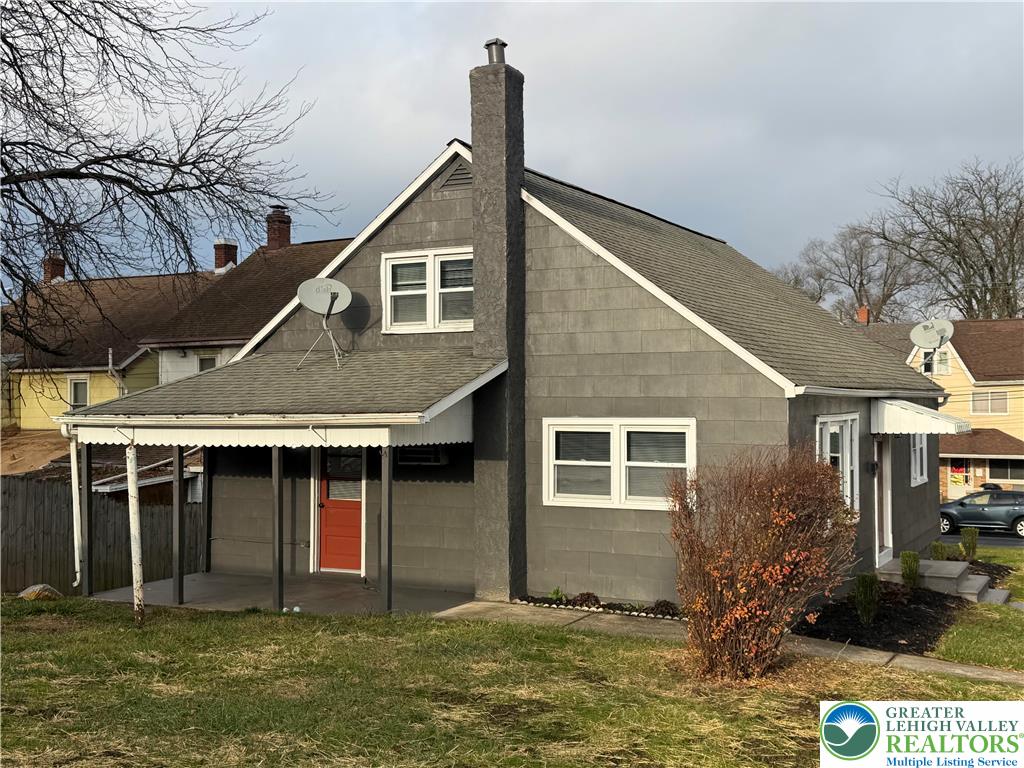 32 North Front Street Coplay, PA 18037 - Photo 3 of 14 a front view of a house with garden