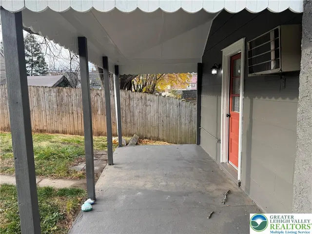 a view of a house with a street