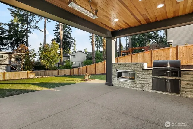 a view of a living room and a fireplace