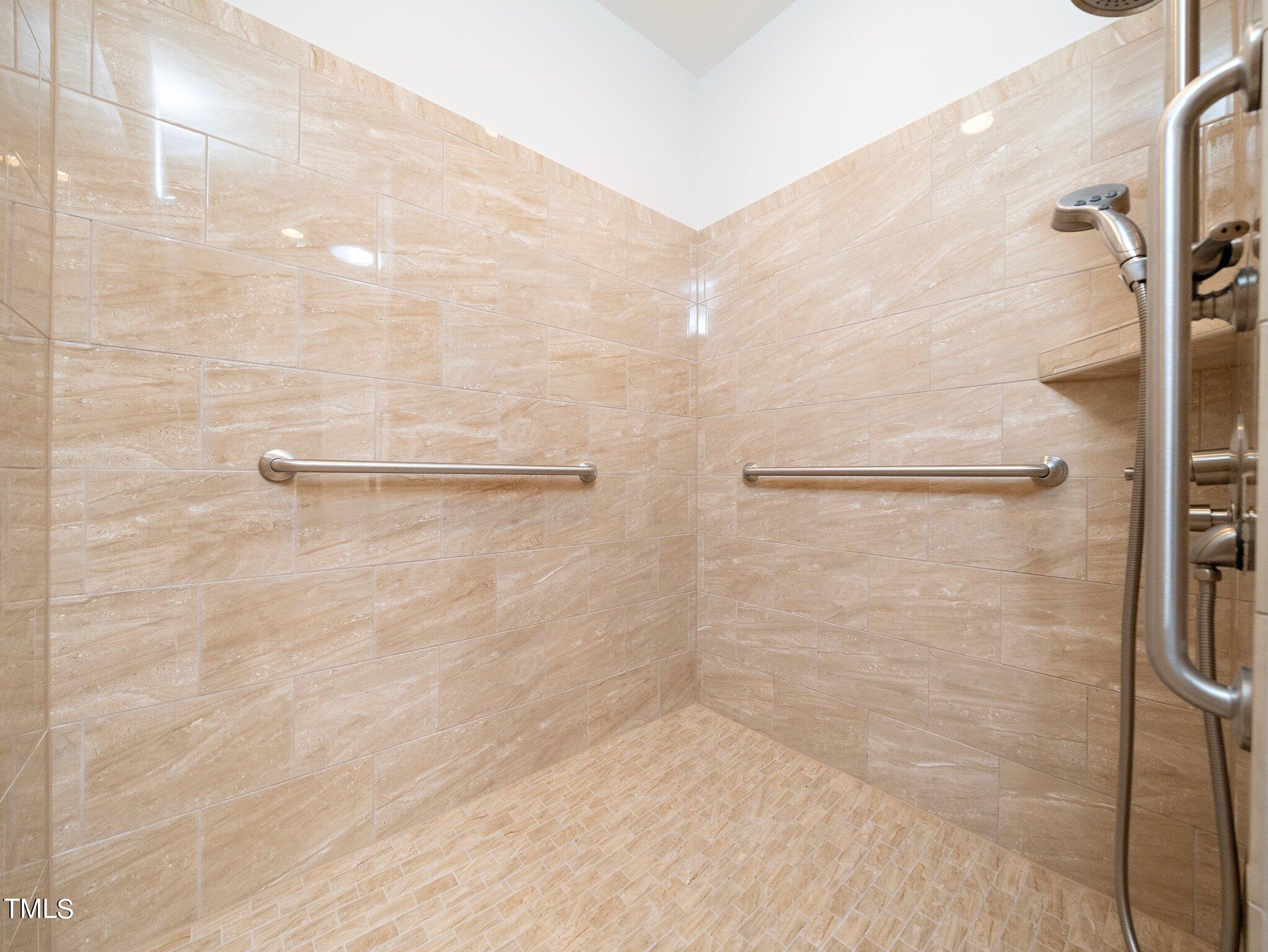 1356 Prevenient Drive Wake Forest, NC 27587 - Photo 20 of 27 a bathroom with a shower