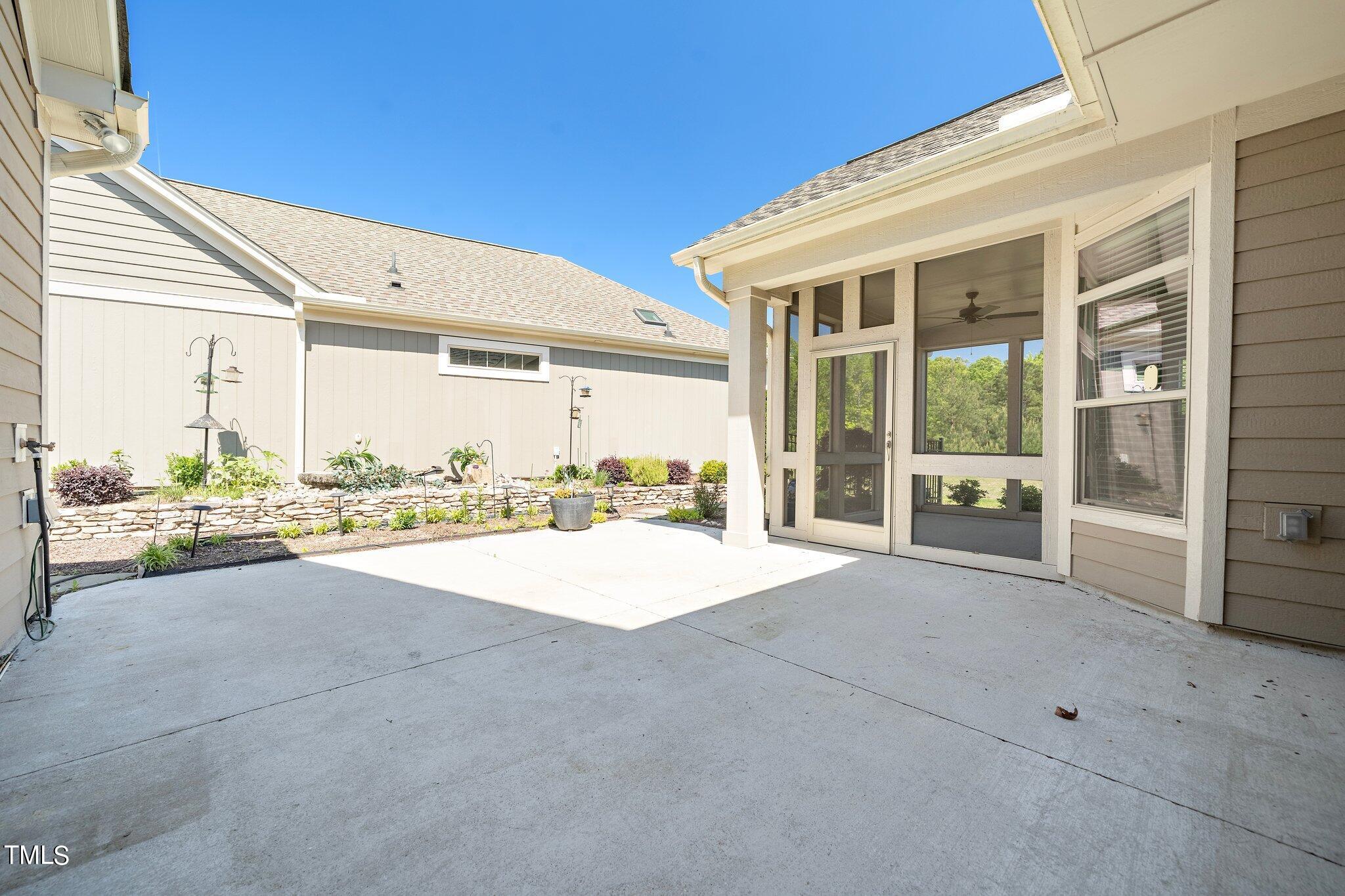 1356 Prevenient Drive Wake Forest, NC 27587 - Photo 25 of 27 a view of an outdoor space with porch and furniture