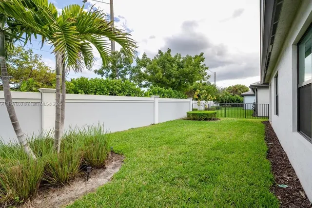a view of a backyard with a garden