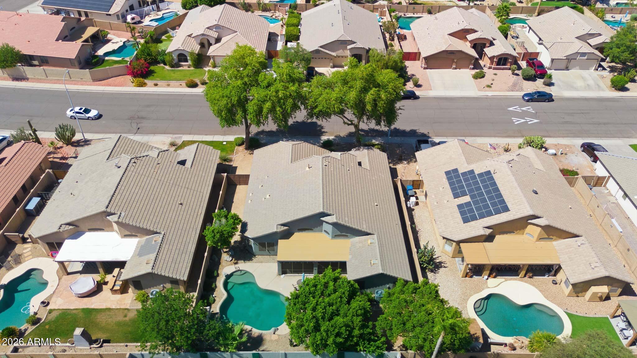 2153 East Kempton Road Chandler, AZ 85225 - Photo 27 of 50 an aerial view of residential houses with outdoor space