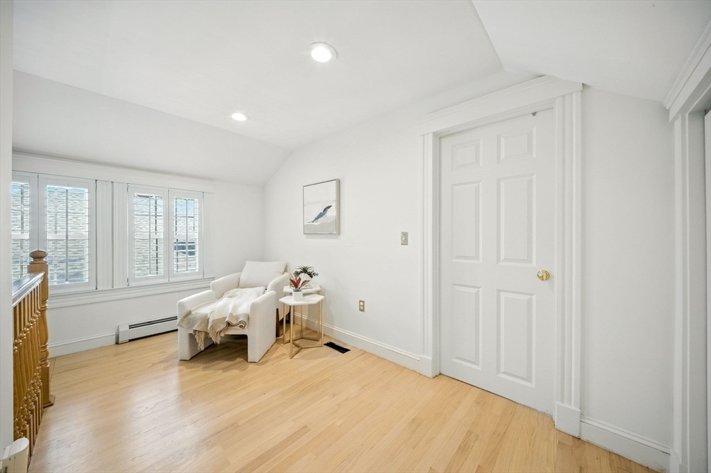 11 Dana Road Newton, MA 02465 - Photo 17 of 35 a spacious bedroom with a bed and a window