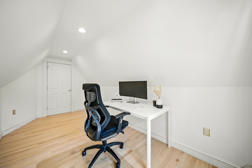 11 Dana Road Newton, MA 02465 - Photo 24 of 35 a view of a workspace with furniture and wooden floor