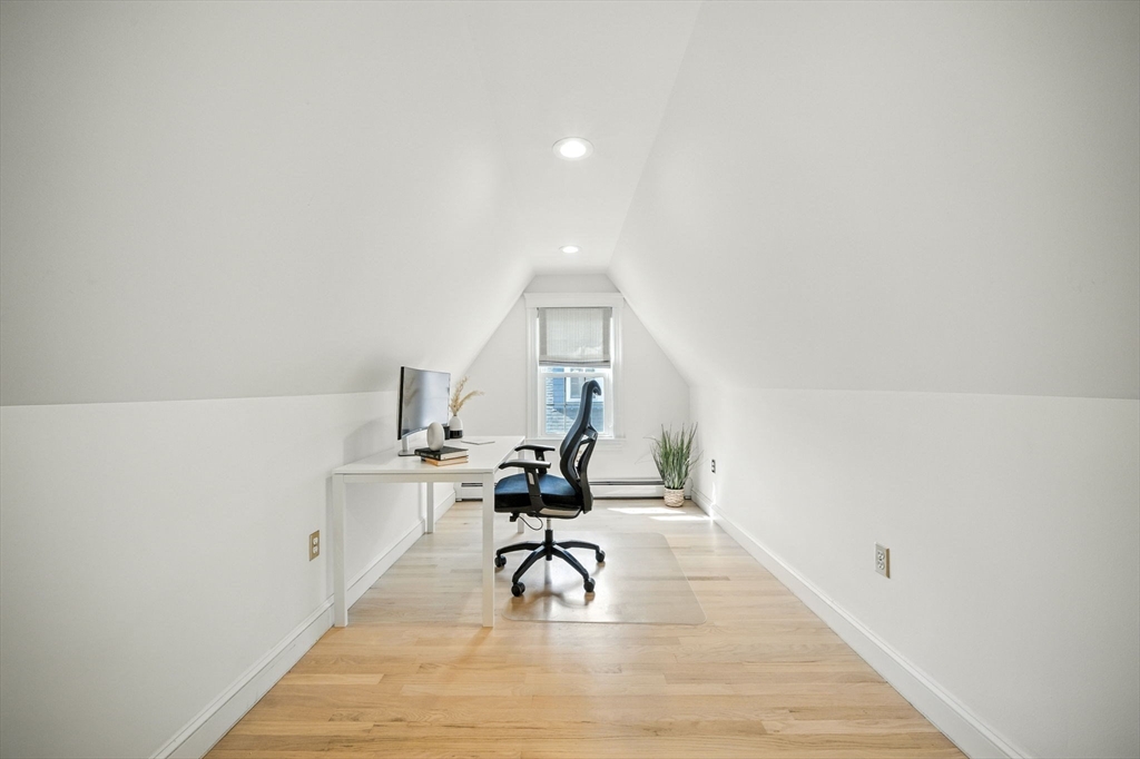 11 Dana Road Newton, MA 02465 - Photo 25 of 35 a view of a workspace with furniture and wooden floor
