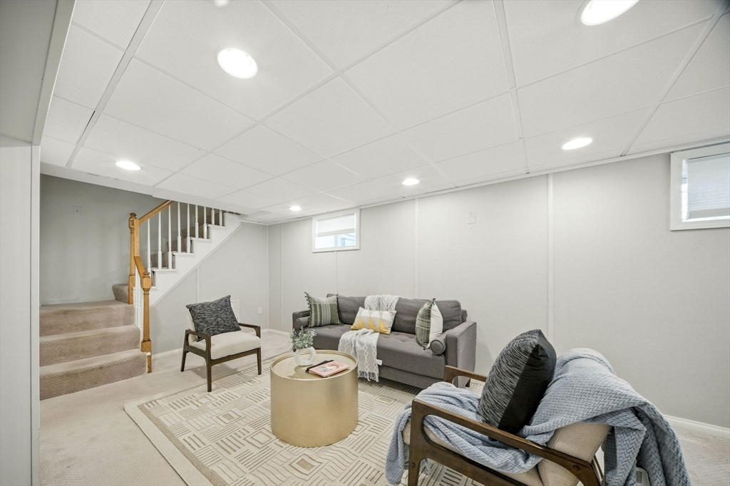 11 Dana Road Newton, MA 02465 - Photo 27 of 35 a living room with furniture and a wooden floor