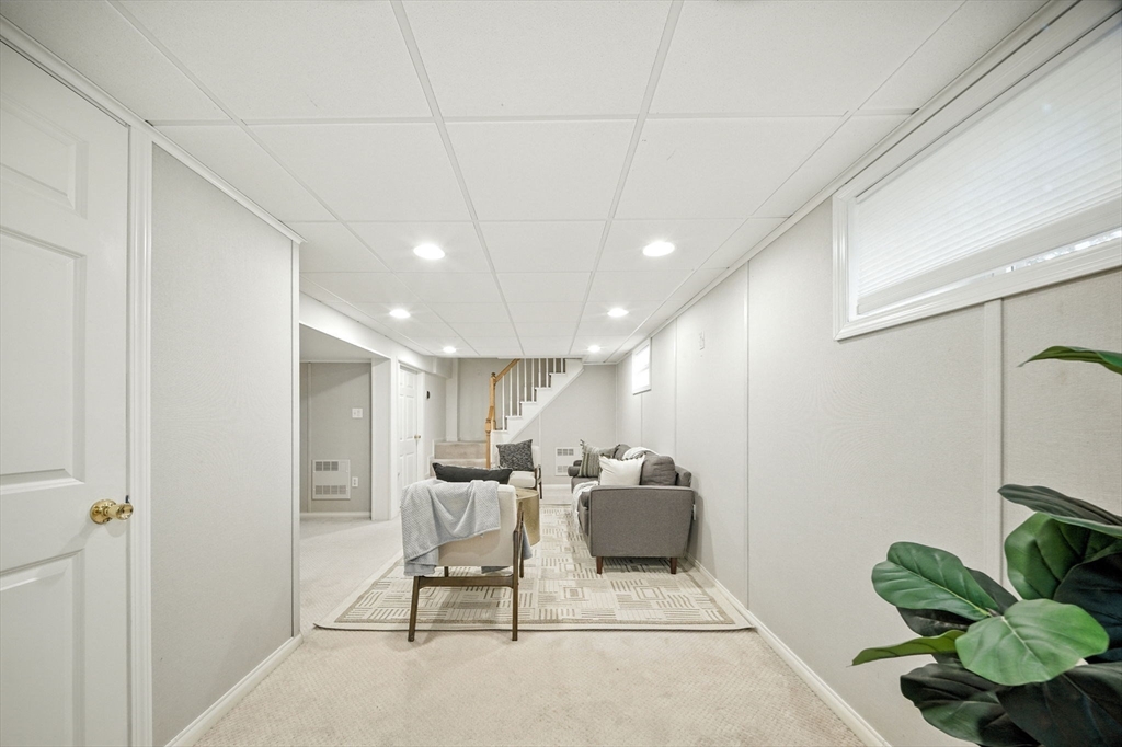 11 Dana Road Newton, MA 02465 - Photo 28 of 35 a view of a livingroom with furniture and a potted plant