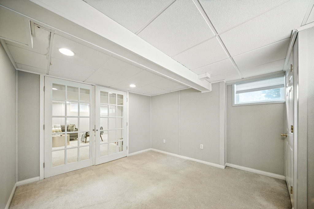11 Dana Road Newton, MA 02465 - Photo 30 of 35 a view of a room with a furniture and mirror