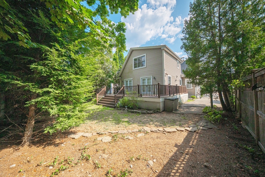 11 Dana Road Newton, MA 02465 - Photo 35 of 35 a view of a house with yard and sitting area