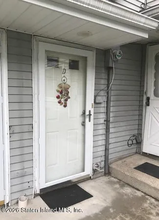 a view of a door and a window