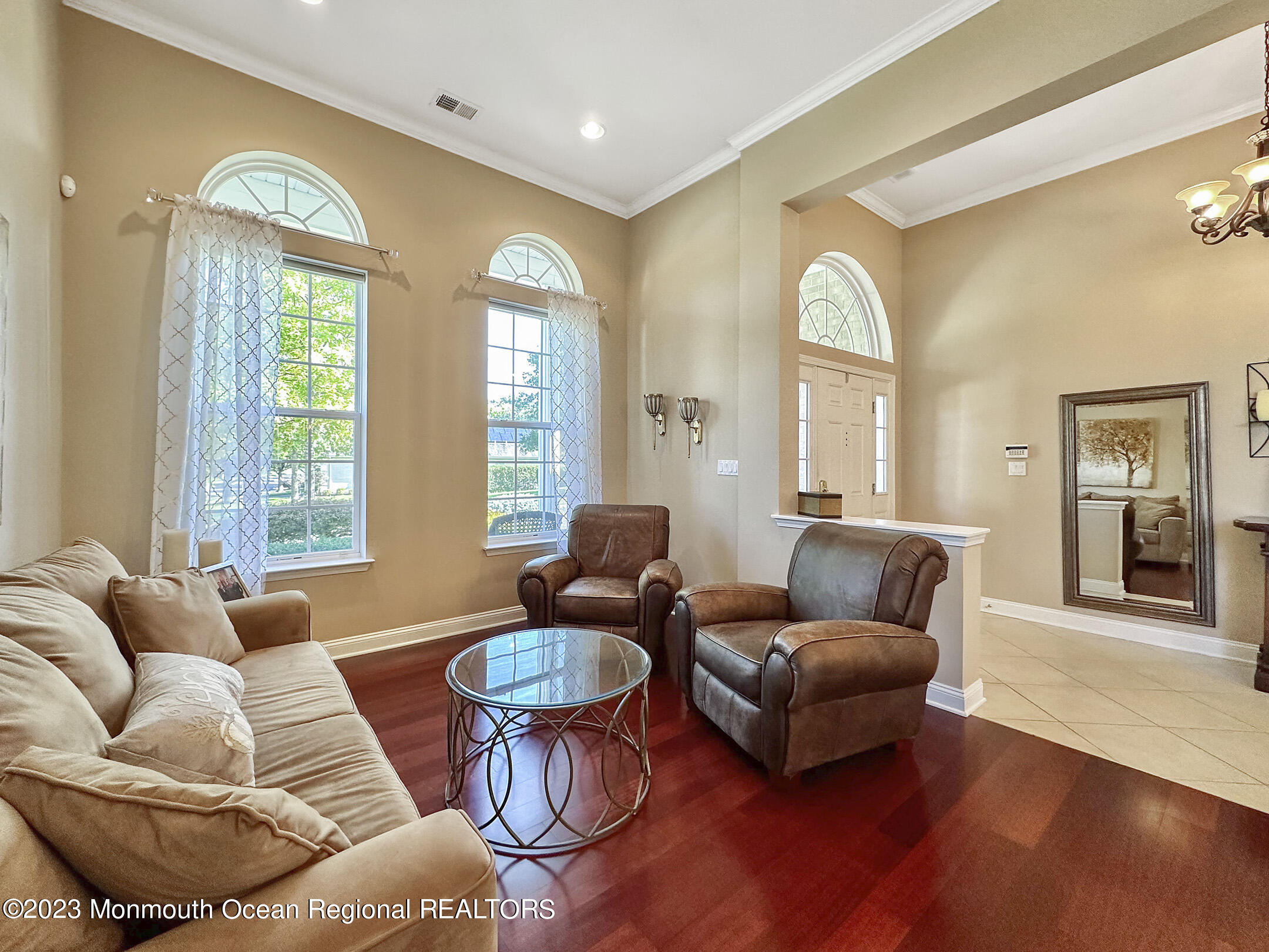 2 Arcaro Road Manalapan, NJ 07726 - Photo 11 of 42 a living room with furniture and a large window