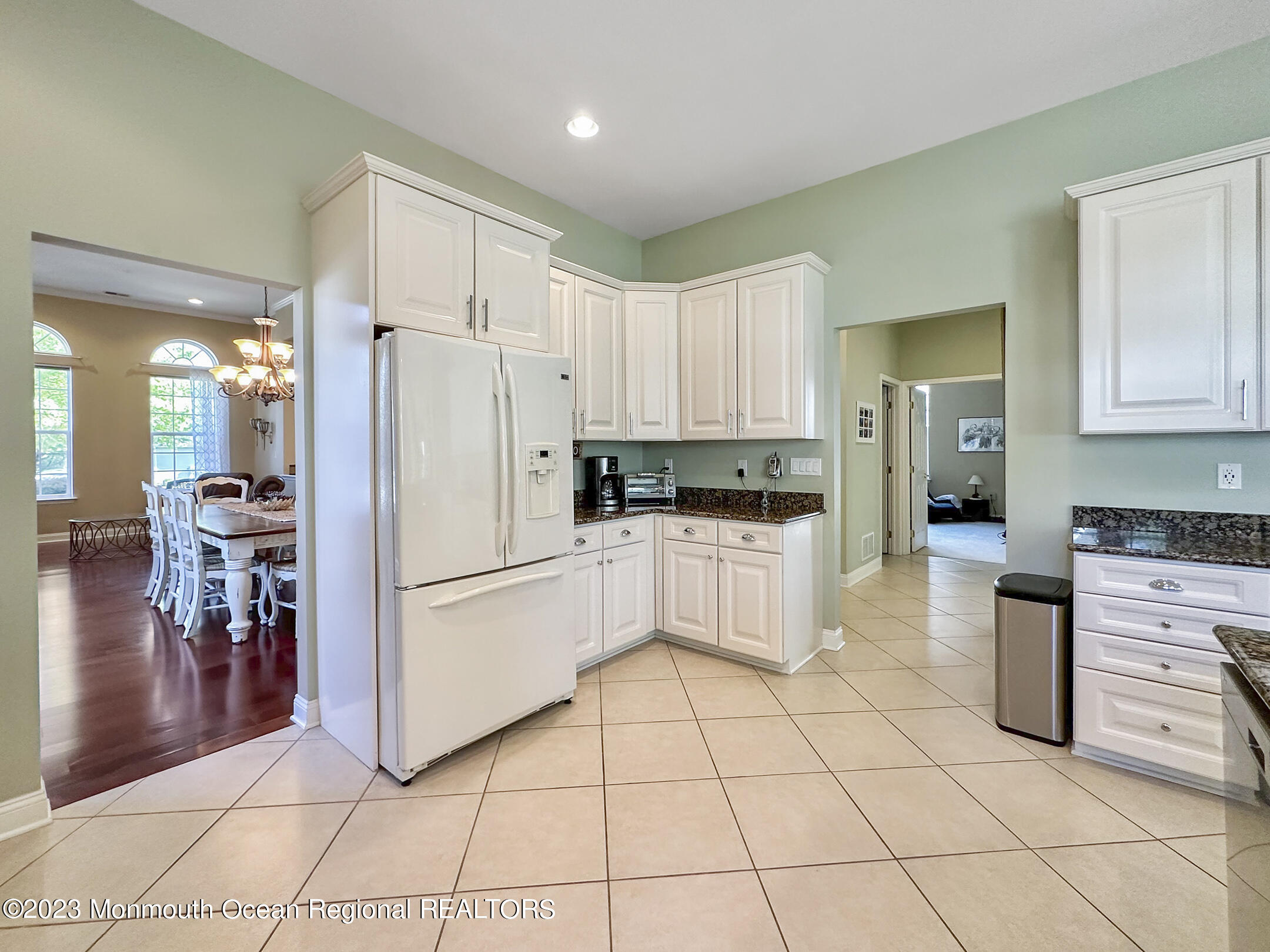 2 Arcaro Road Manalapan, NJ 07726 - Photo 16 of 42 a kitchen with cabinets and stainless steel appliances