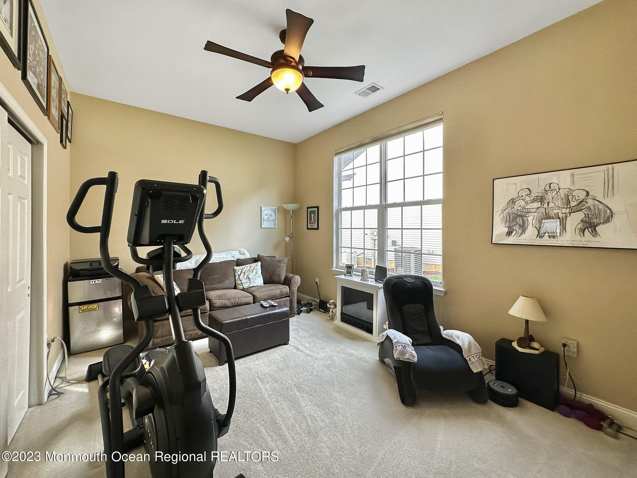 2 Arcaro Road Manalapan, NJ 07726 - Photo 29 of 42 a living room with furniture and a window