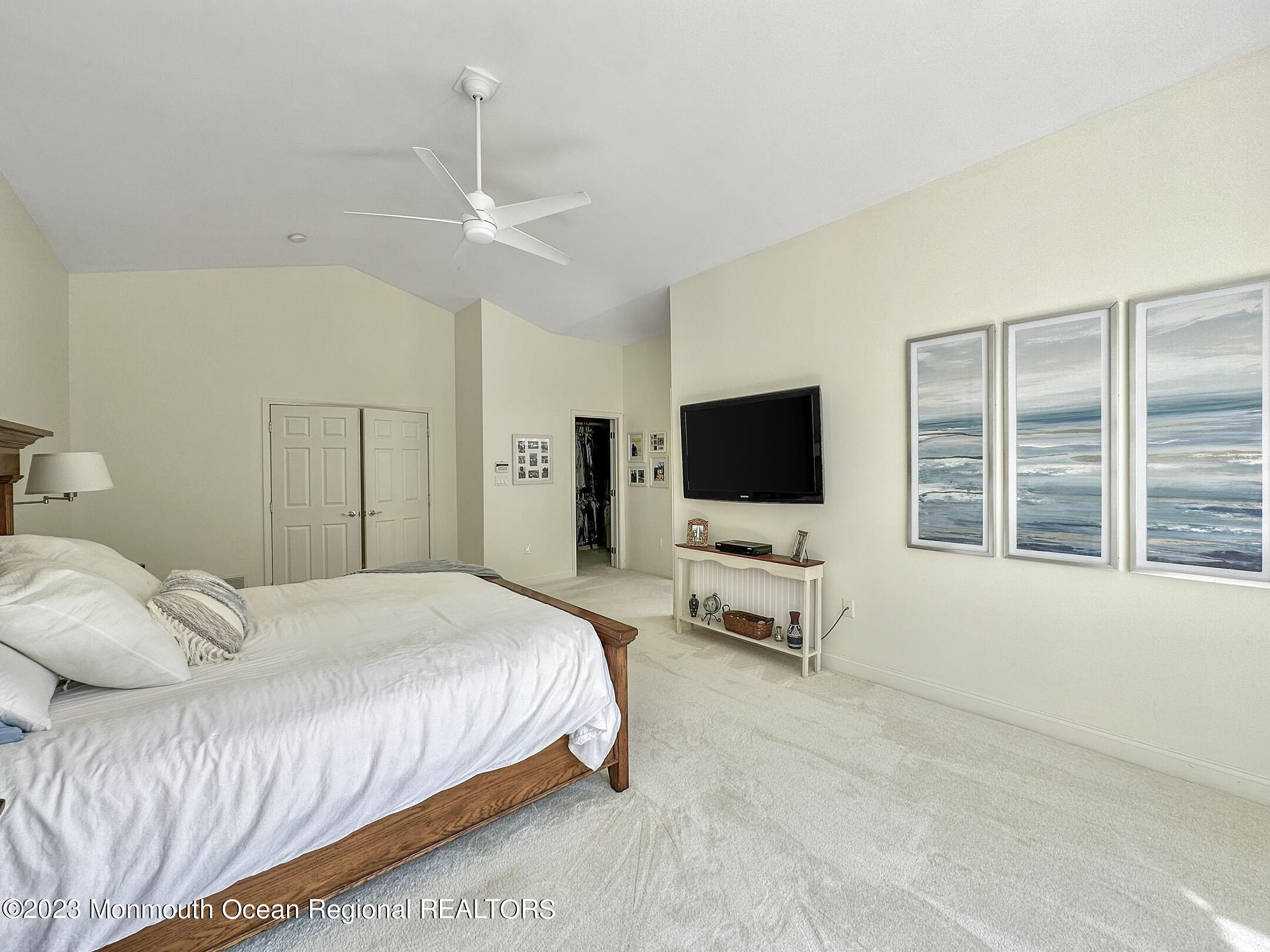 2 Arcaro Road Manalapan, NJ 07726 - Photo 33 of 42 a bedroom with a bed flat screen tv and a window