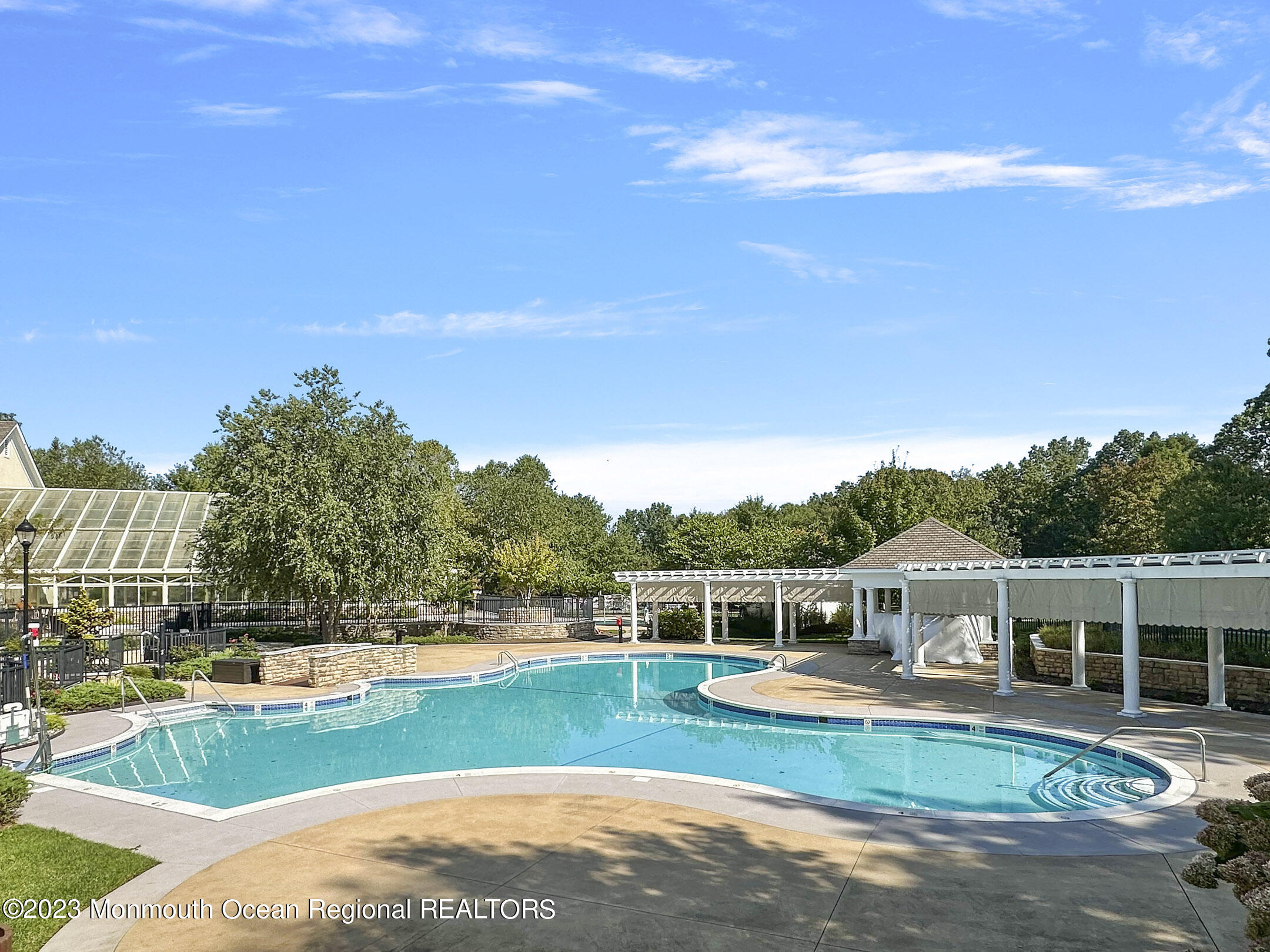 2 Arcaro Road Manalapan, NJ 07726 - Photo 39 of 42 a front view of a house with garden