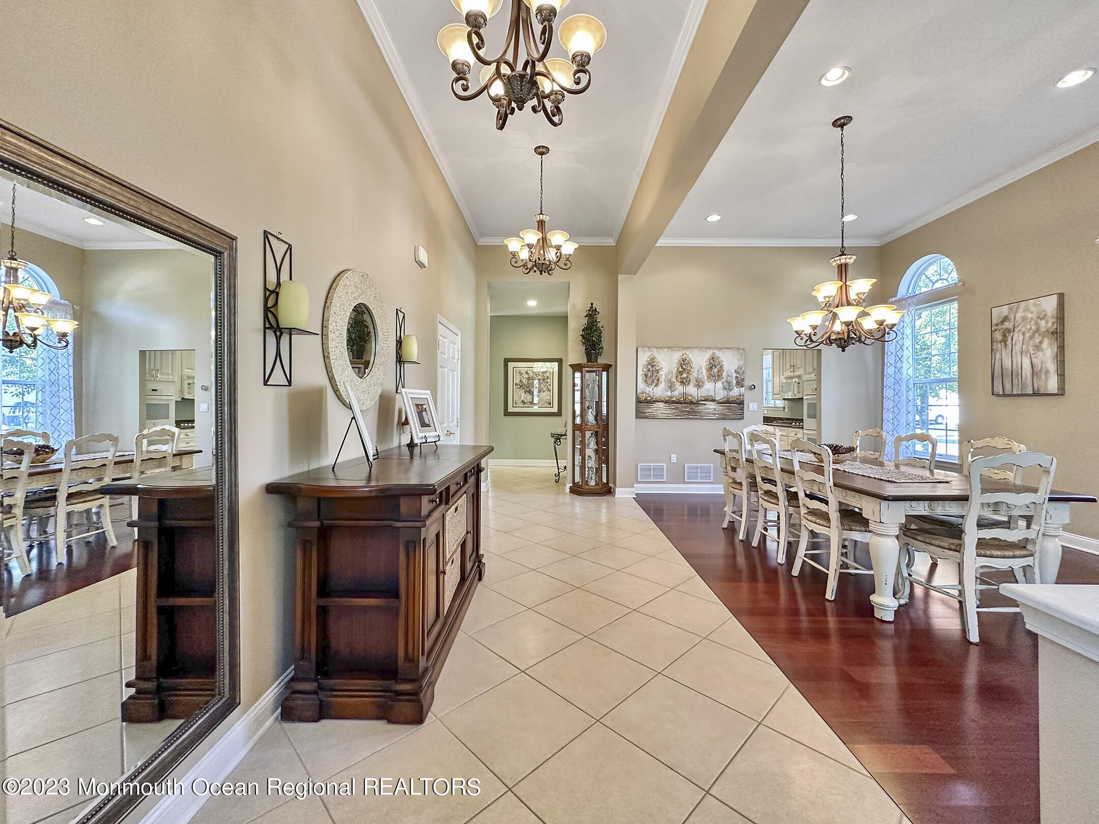2 Arcaro Road Manalapan, NJ 07726 - Photo 6 of 42 a view of a dining room with furniture wooden floor and chandelier