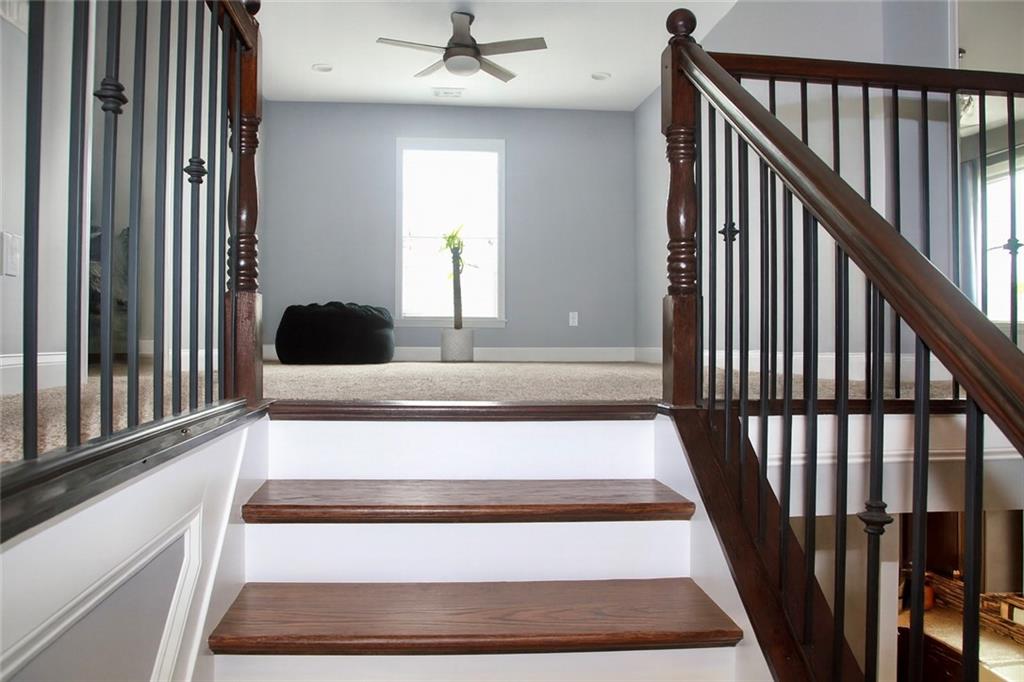830 Commerce Trail Canton, GA 30114 - Photo 15 of 32 a view of entryway and hall with wooden floor