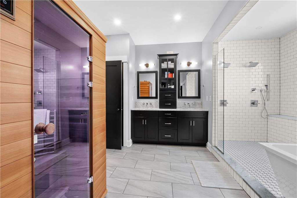 211 McMichael Road Carnegie, PA 15106 - Photo 22 of 50 a spacious bathroom with a granite countertop sink mirror and shower