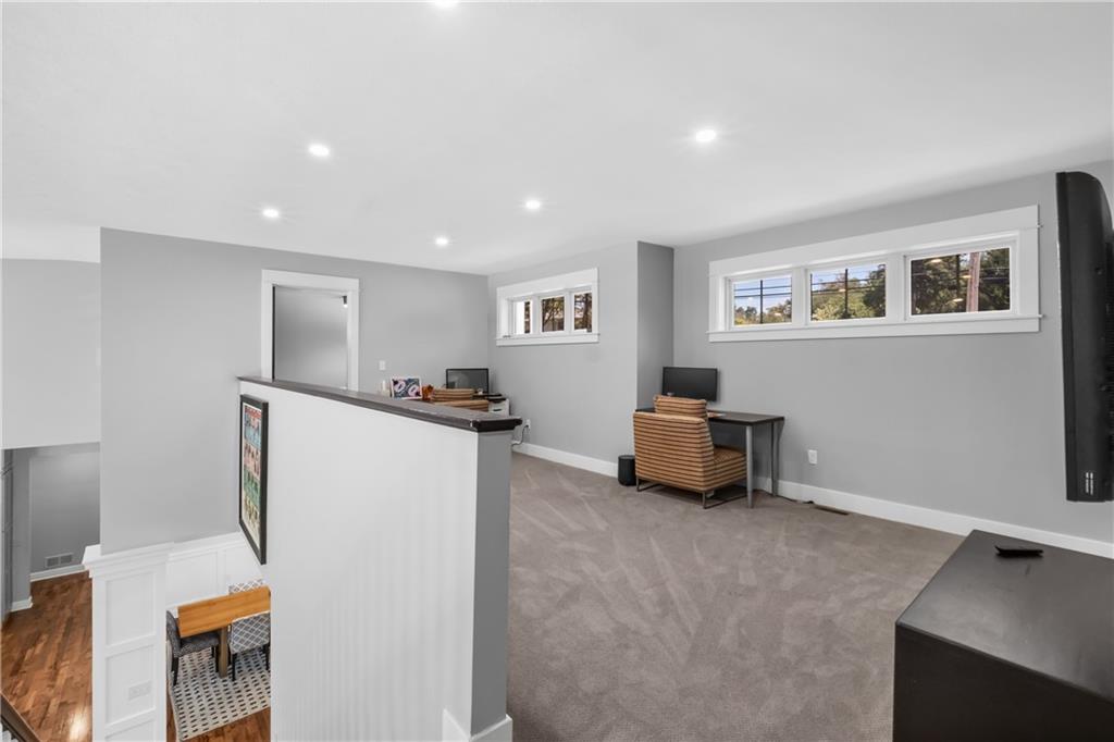 211 McMichael Road Carnegie, PA 15106 - Photo 24 of 50 a living room with furniture and a flat screen tv