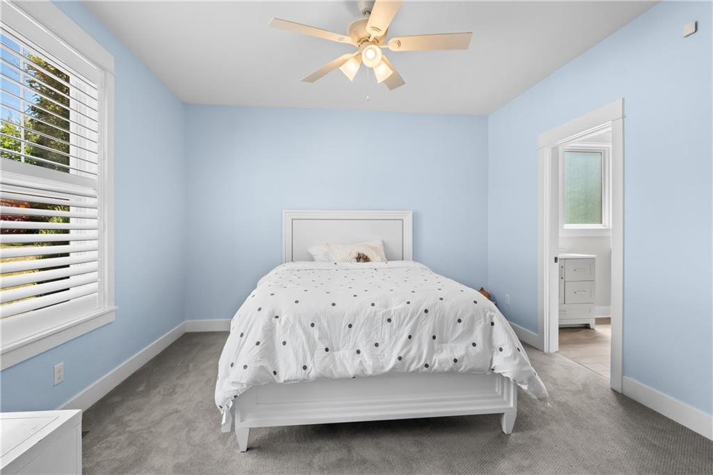 211 McMichael Road Carnegie, PA 15106 - Photo 29 of 50 a white bed sitting in a bedroom next to a window