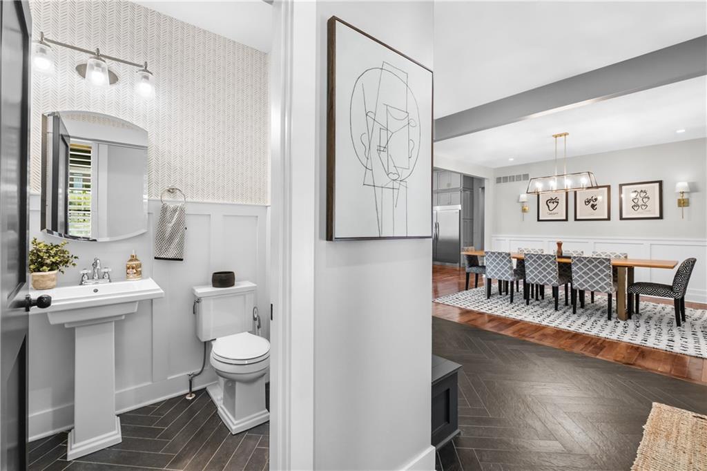 211 McMichael Road Carnegie, PA 15106 - Photo 31 of 50 a very nice looking room with a wooden floor and a bathroom