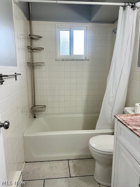4376 Darrow Road, Unit 2 Stow, OH 44224 - Photo 16 of 26 Full bath featuring tile walls, vanity, shower / bath combo, and toilet