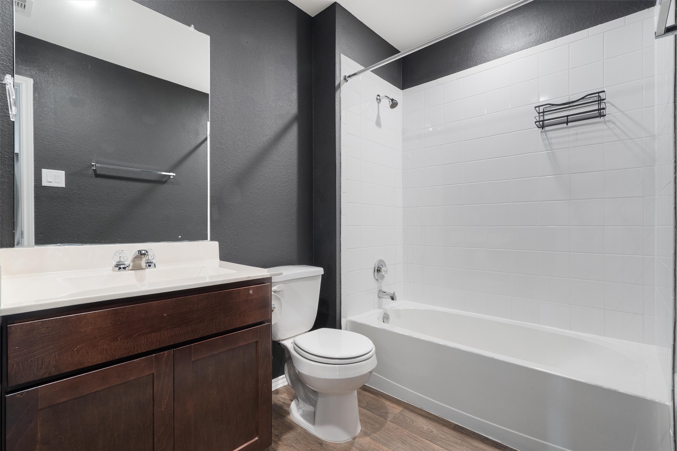 352 Sickle Loop Uhland, TX 78640 - Photo 29 of 36 Bathroom with shower / bath combination and vanity.