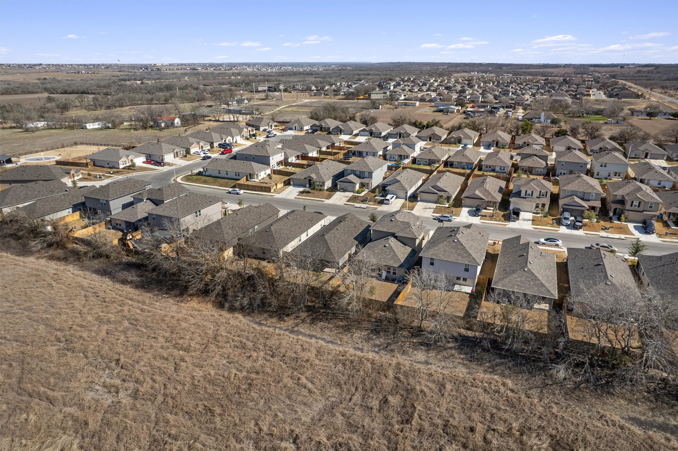 352 Sickle Loop Uhland, TX 78640 - Photo 34 of 36 Aerial view of property within subdivision.