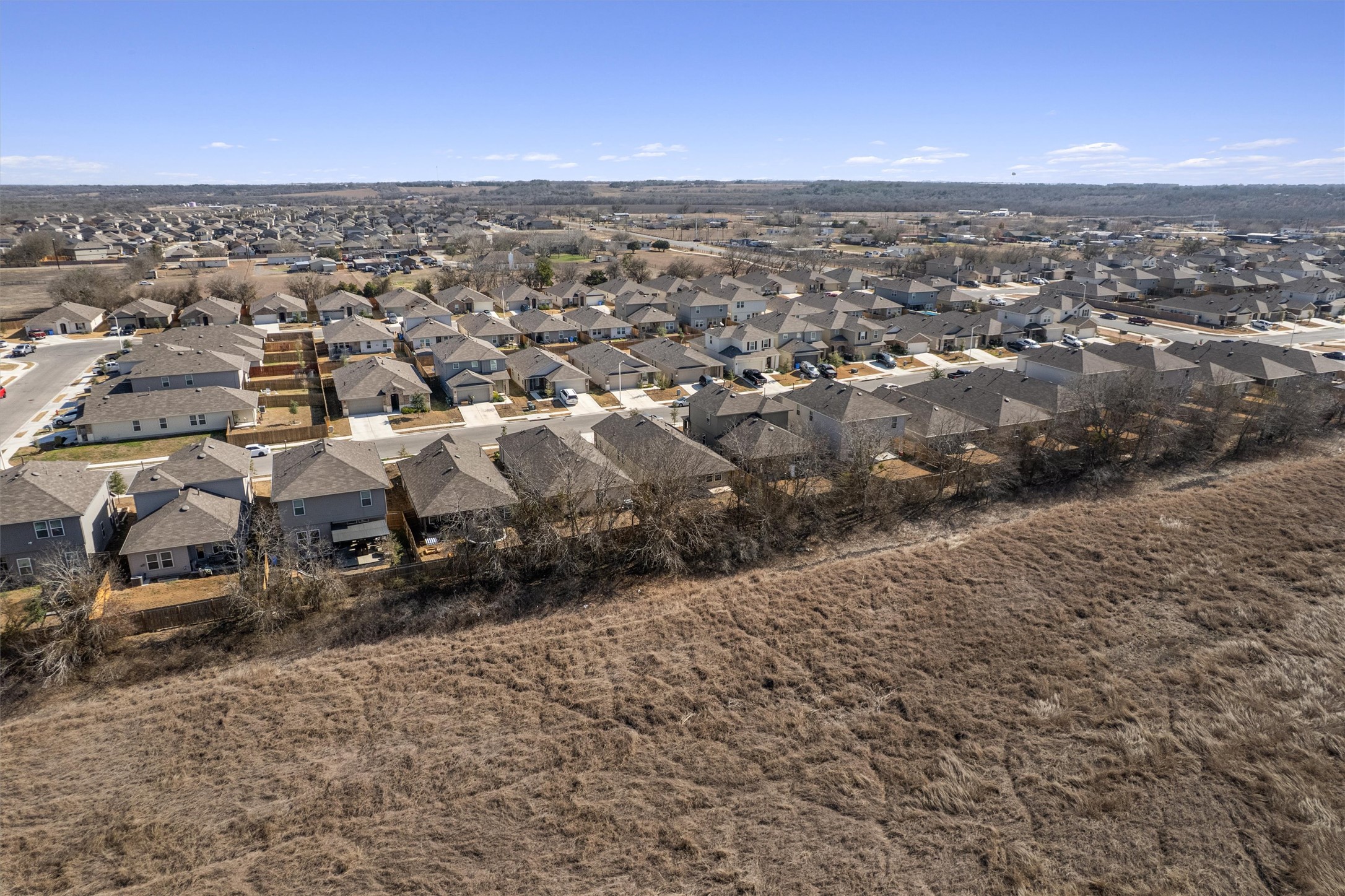 352 Sickle Loop Uhland, TX 78640 - Photo 35 of 36 Aerial perspective of suburban area