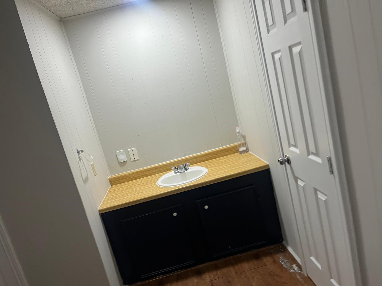 12123 Alpha Lane, Unit 1 Houston, TX 77072 - Photo 6 of 6 a bathroom with a sink and a mirror