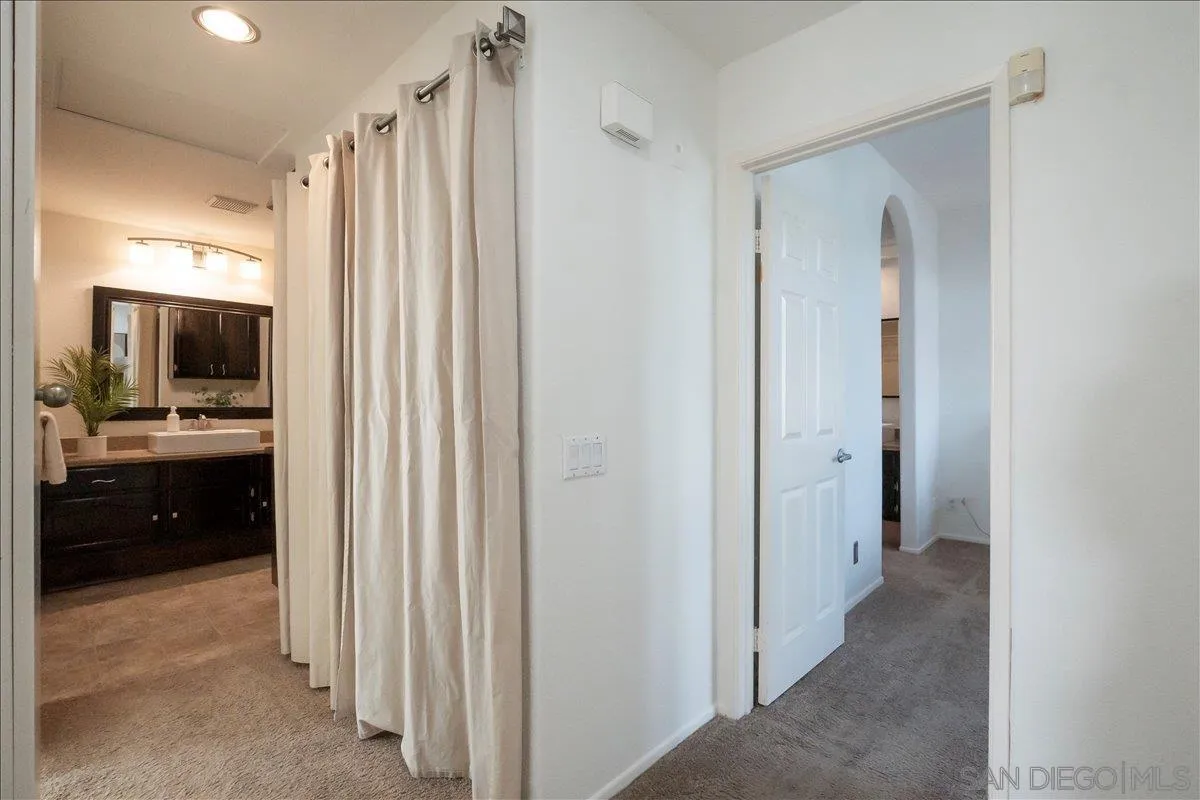 2315 Rancho Del Oro Drive, Unit 14 Oceanside, CA 92056 - Photo 16 of 34 a view of a bathroom with a bathroom
