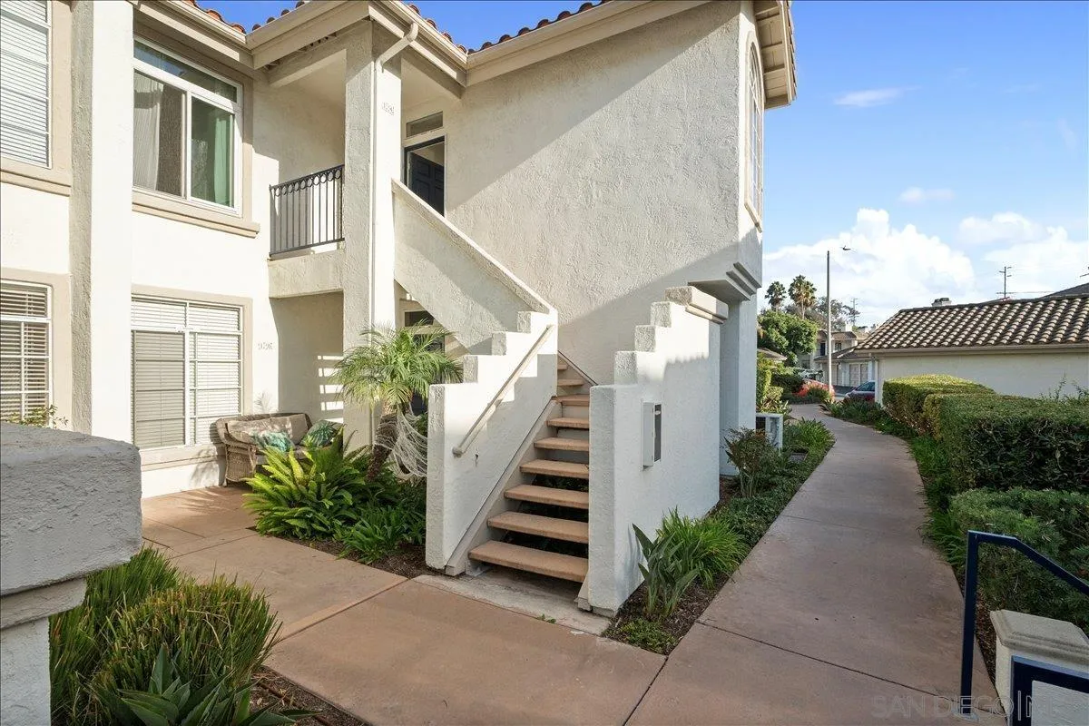 2315 Rancho Del Oro Drive, Unit 14 Oceanside, CA 92056 - Photo 19 of 34 a view of a potted plants in front of a house