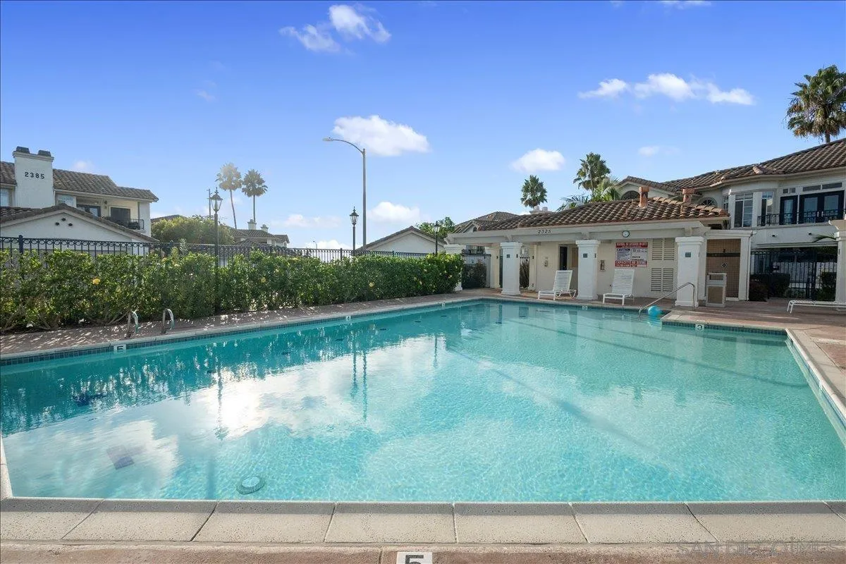 2315 Rancho Del Oro Drive, Unit 14 Oceanside, CA 92056 - Photo 26 of 34 a view of a house with a yard