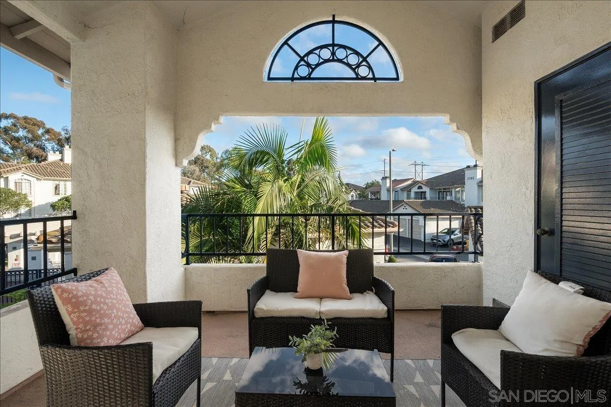 2315 Rancho Del Oro Drive, Unit 14 Oceanside, CA 92056 - Photo 9 of 34 a view of a living room and a window