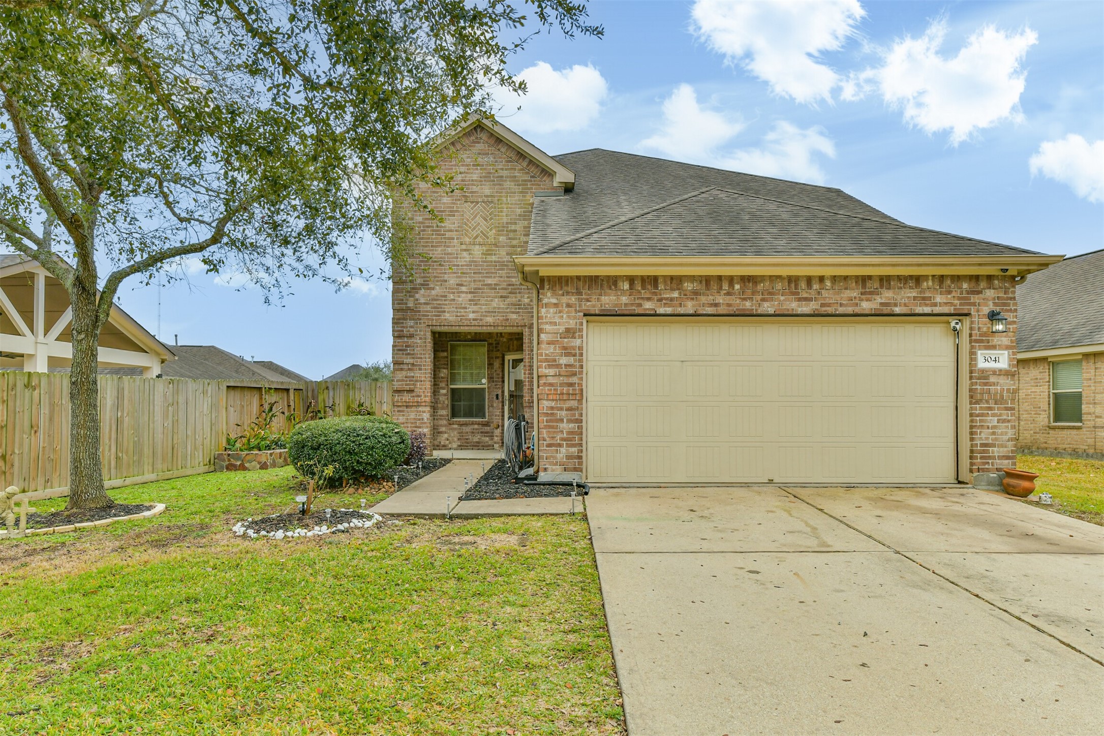 3041 Heather Grove Lane Dickinson, TX 77539 - Photo 1 of 37 a view of a house with a yard
