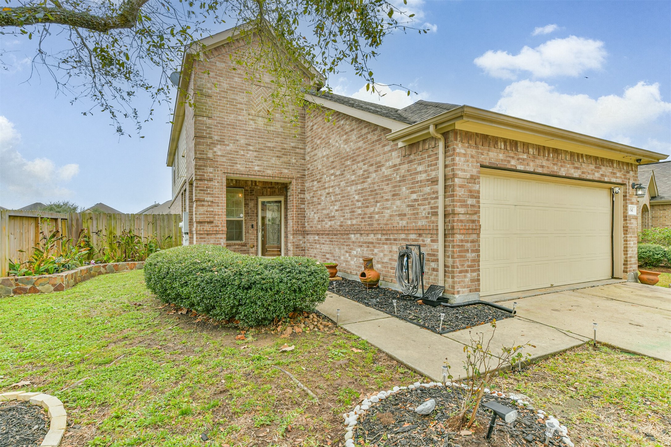 3041 Heather Grove Lane Dickinson, TX 77539 - Photo 2 of 37 a front view of a house with a yard