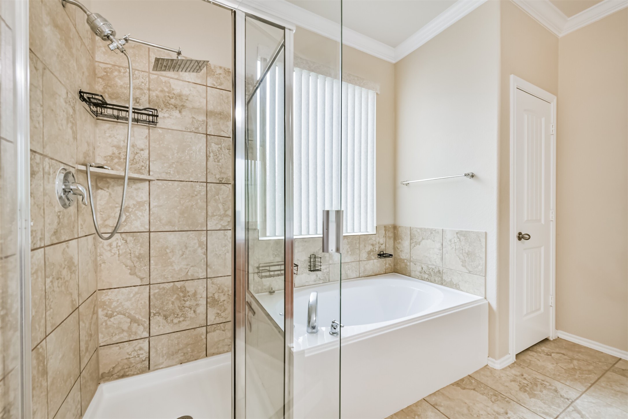 3041 Heather Grove Lane Dickinson, TX 77539 - Photo 22 of 37 a bathroom with a tub and shower