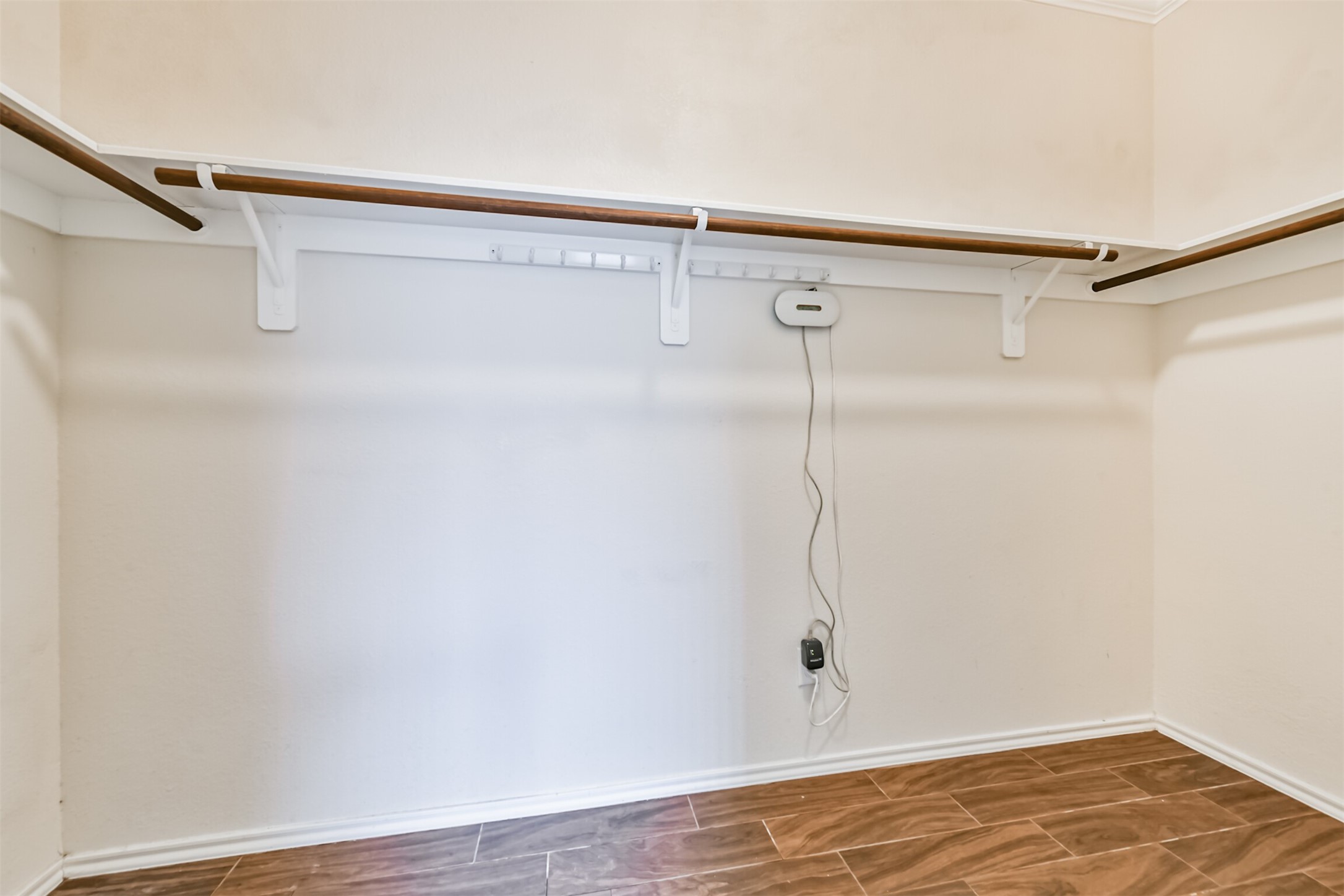 3041 Heather Grove Lane Dickinson, TX 77539 - Photo 24 of 37 a view of a room with wooden floor and fan