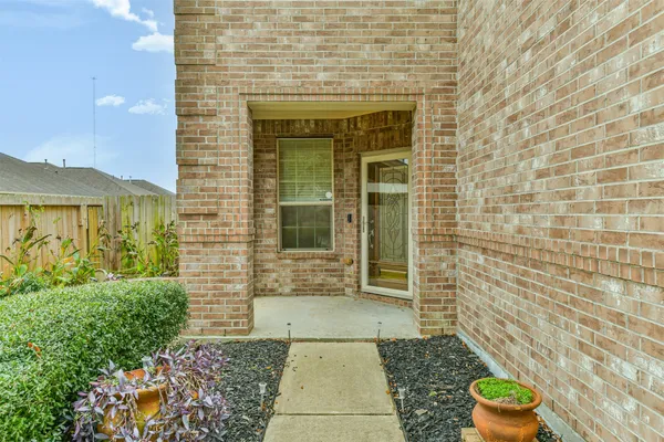 a view of a hallway with entryway