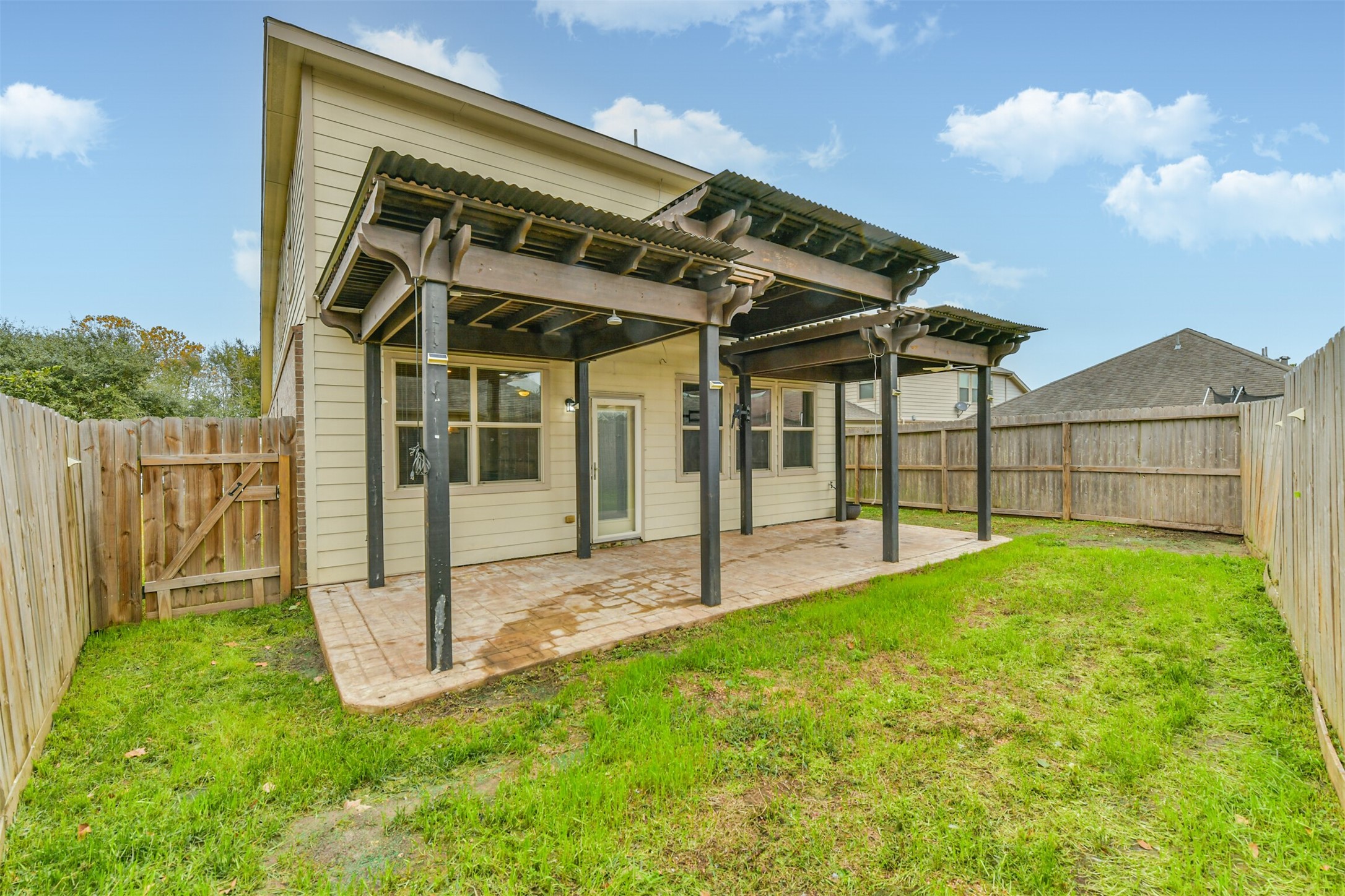 3041 Heather Grove Lane Dickinson, TX 77539 - Photo 36 of 37 a view of a house with backyard and porch