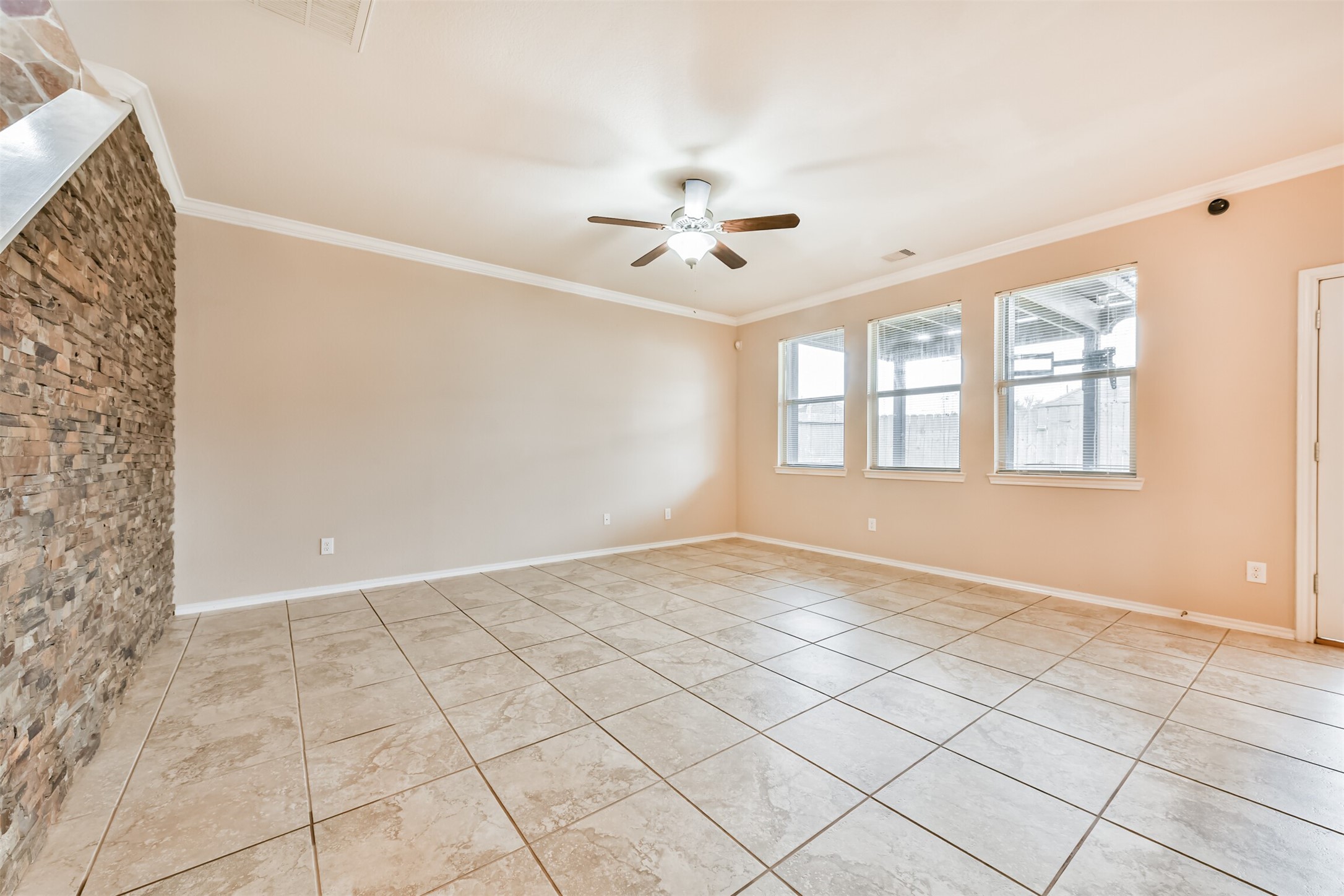 3041 Heather Grove Lane Dickinson, TX 77539 - Photo 7 of 37 a view of an empty room with a window