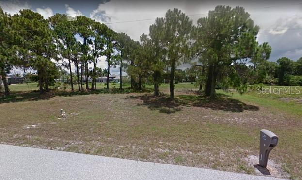 57 Tournament Road Rotonda West, FL 33947 - Photo 1 of 1 Front