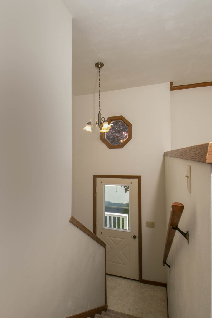 118 Newport Road Lake Summerset, IL 61019 - Photo 6 of 34 a view of a storage & utility room with a window