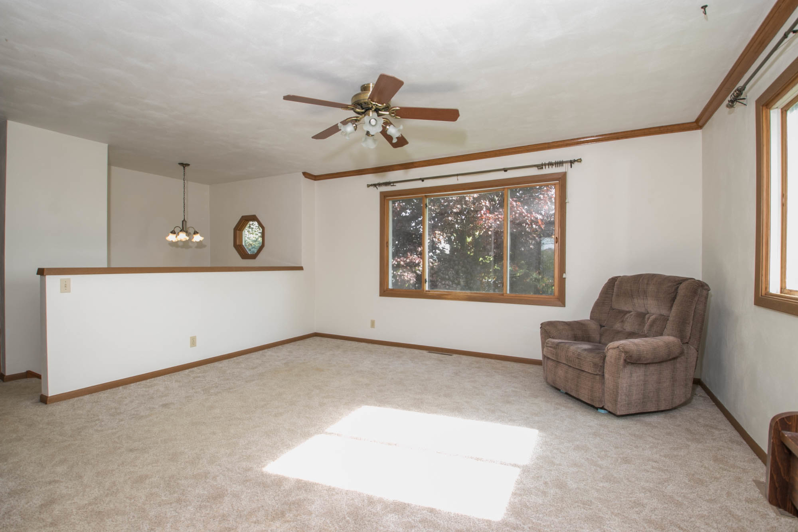 118 Newport Road Lake Summerset, IL 61019 - Photo 7 of 34 a living room with furniture and a window